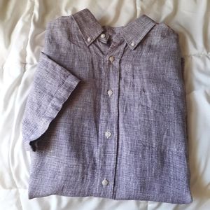 Purple linen button-up shirt.